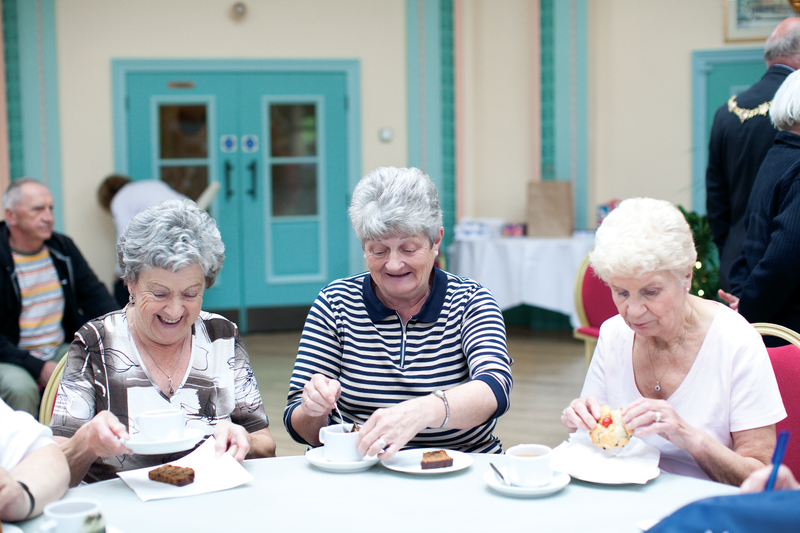 edlerly ladies sat at a table